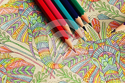 The coloring book with pencils Stock Photo