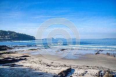 Colors Of The Sunset. Landscapes, beach and sunset at Patos beach located in the Pontevedra town of NigrÃ¡n Galicia, Spain. Stock Photo
