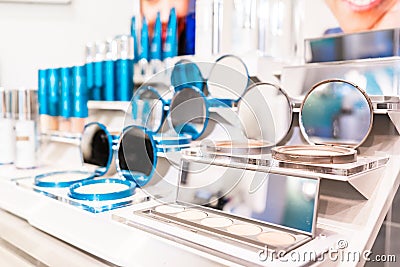 Colorscience tester products on retail display at a makeup counter store, selling the cosmetics. Editorial Stock Photo