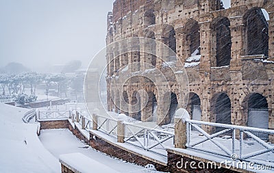 Snow in Rome on February 2018, the Colosseum in the morning while snowing. Stock Photo