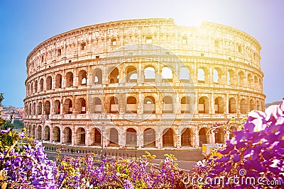 Colosseum of Rome sunset view, famous landmark of eternal city Stock Photo