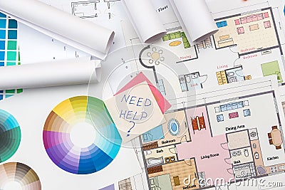 Colour palettes with house plan on desk top view. Designer working at new project Stock Photo