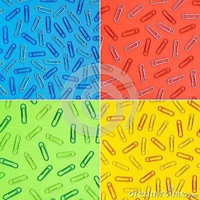 Colour paper clips on colourful paper Stock Photo