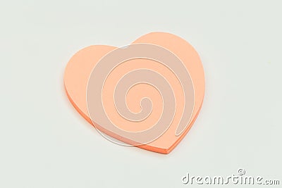 Colour paper heart stick note on a white background Stock Photo