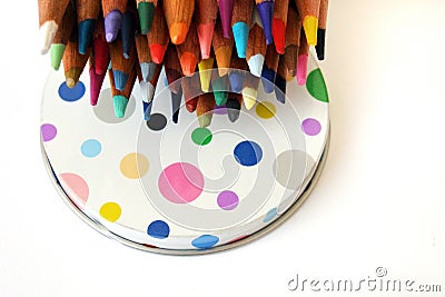 Colour pencils on polka dots fun concept Stock Photo