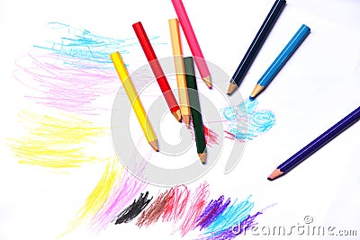 Colour pencils on white paper background paint education concept - wooden crayon multicolored drawings Stock Photo