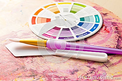 Colour Wheel and Painting Accessories Stock Photo