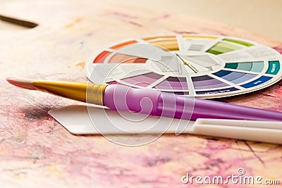 Colour Wheel and Painting Accessories Stock Photo