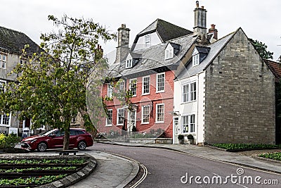 Coloured houses along Market Hill, Calne, Wiltshire Editorial Stock Photo