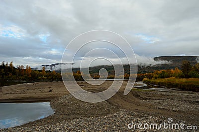 Colourful autumn landscape with river flow Stock Photo