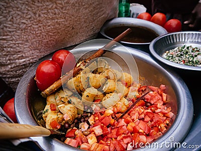 Colourful Bangladesh street food with tomato, beans and potato Stock Photo