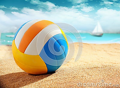 Colourful beach ball on the sand Stock Photo