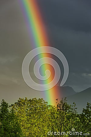 Colourful beautiful rainbow in the sky Stock Photo