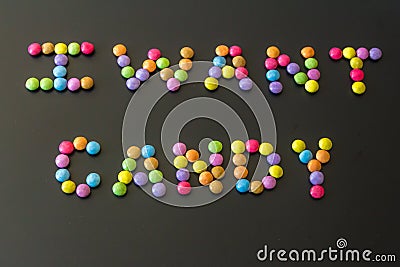 Colourful candy concept spelled out in words Stock Photo