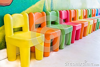 Colourful chairs in the playroom Stock Photo