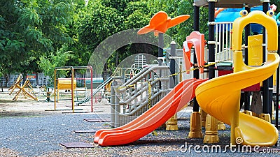 A colourful children playground equipment play ground in park. Stock Photo