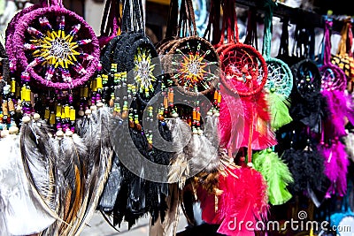 A colourful collection of Indian tokens for sale at the Indian Market in Otavalo in Ecuador. Stock Photo