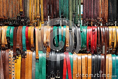 Colourful display of belts in market Stock Photo