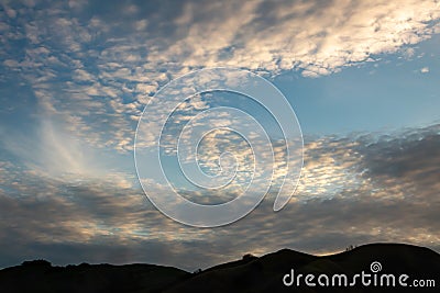 Colourful evening sky with unusual cloud formations Stock Photo