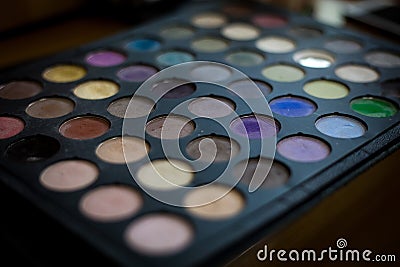 Colourful eye shadows palette Professional cosmetics for the creation of modern makeup. multi-colored eye shadow palette Stock Photo