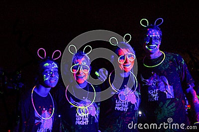 Colourful Glow Run people of Africa Editorial Stock Photo