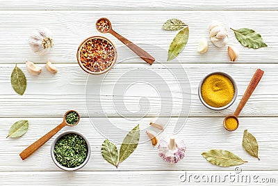 Colourful herbs spices and flavoring for cooking Stock Photo