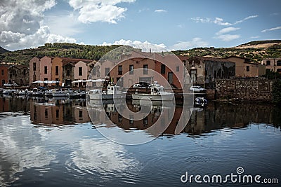 Colourful houses of Bosa, Sardinia reflecting in the river Editorial Stock Photo