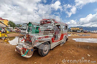 Colourful Jeepney at the harbour of Coron Editorial Stock Photo