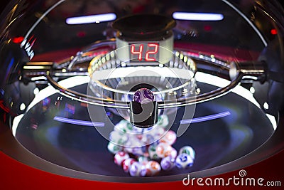 Colourful lottery balls in a lotto machine 42 Stock Photo