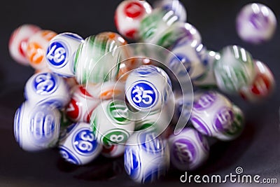 Colourful lottery balls in a machine 35 Stock Photo
