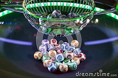 Colourful lottery balls in a machine Stock Photo