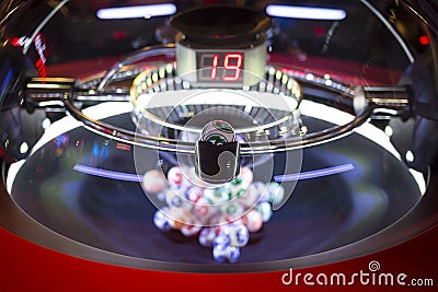 Colourful lottery balls in a machine 19 Stock Photo