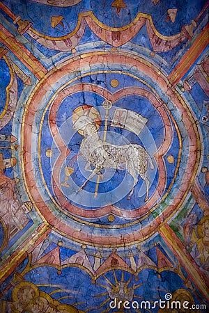 Colourful medieval painting on the ceiling of the main nave in Braunschweig Cathedral, with the peaceful sheep of Jesus in the Stock Photo