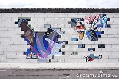 Colourful murals cover a section of the former infamous Berlin Wall in Germany. Editorial Stock Photo