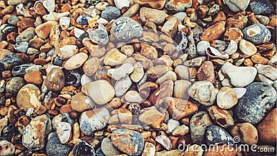 Colourful pebbles on Brighton beach Stock Photo