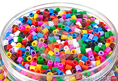 Colourful plastic small cylinders toys Stock Photo