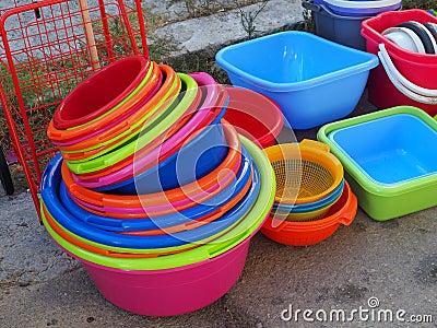 Colourful Plastic Tubs and Buckets Stock Photo