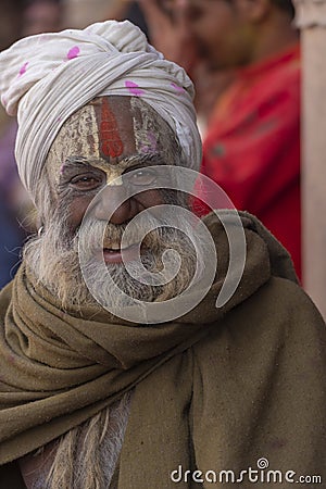 Colourful portrait of a Baba during samaj at Holi Festival at Nandgaon,UttarPradesh,India,Asia Editorial Stock Photo