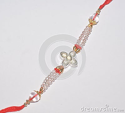 A colourful Rakhi with white stones. Stock Photo