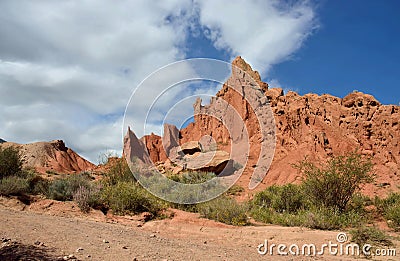 Colourful red rocks of Skazka Fairy tale canyon,Kyrgyzstan Stock Photo