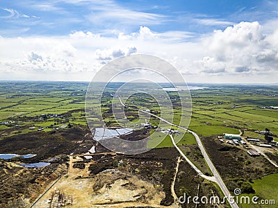 The colourful remains of the former copper mine Parys Mountain near Amlwch on the Isle of Anglesey, Wales, UK Stock Photo