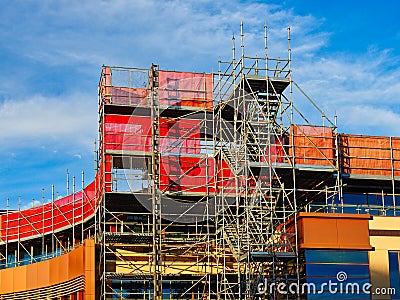 Colourful Scaffolding Cladding on Building Site Stock Photo