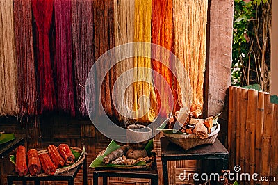 Colourful silk thread and natural colour dye raw material Editorial Stock Photo