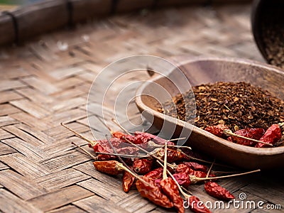 Colourful spicy chilis in wooden tray. Asian popular cooking ingredients, dry hot healthy cook herbs. view form above and copy Stock Photo