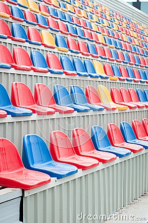 Colourful stadium seats Stock Photo