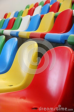 Colourful stadium seats Stock Photo