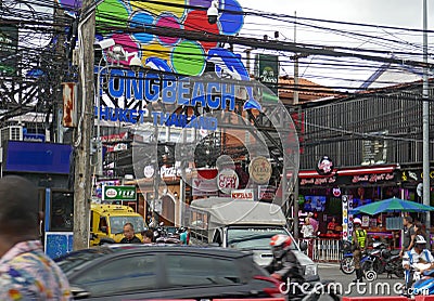 The colourful streets of Thailand`s Phuket street signage and road down to the very popular Patong Beach. Editorial Stock Photo