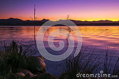 Colourful sunset at Lake Moogerah in Queensland Stock Photo