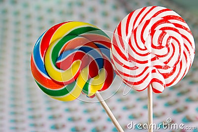 Colourful sweets candy rainbow and peppermint swirl lollipop close up macro photography Stock Photo