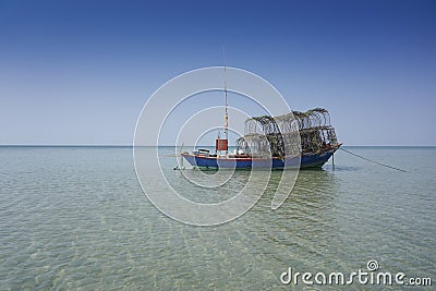 Colourful Thailand fishing boats at sunset wood fishing boats used in Asia for sustainable fishing in shallow seas Editorial Stock Photo